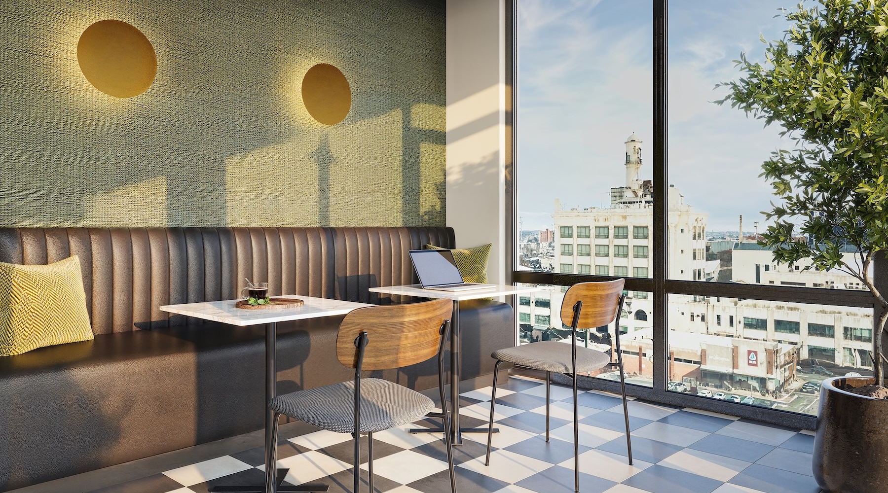 Enjoy our resident-only features a workroom with tables and chairs and a large window with a view of a city