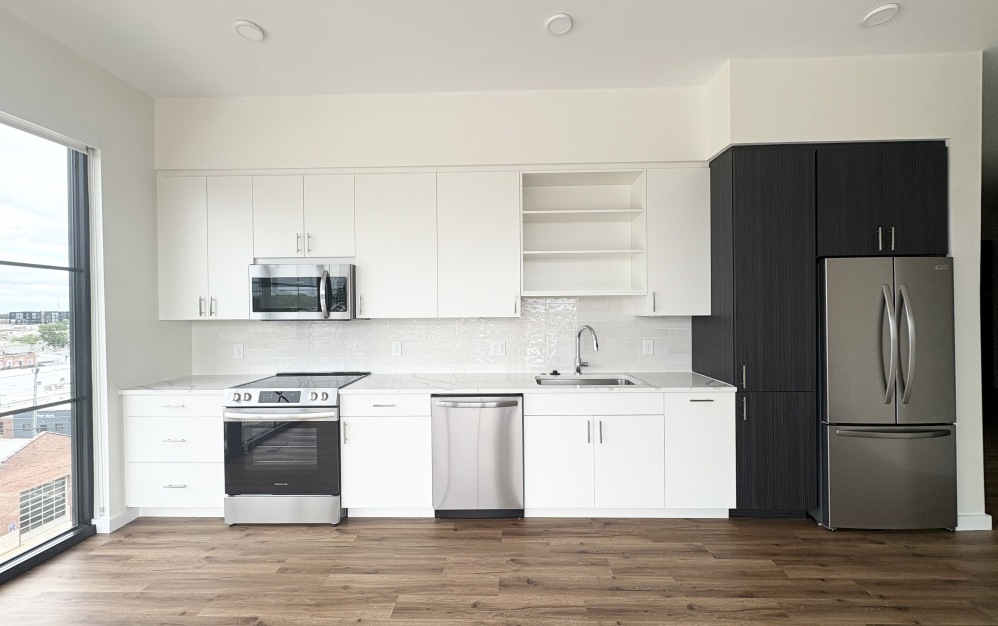 two bedroom kitchen with stainless steel appliances