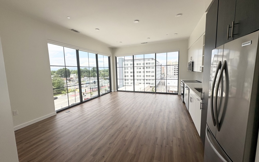 two bedroom living room with natural light