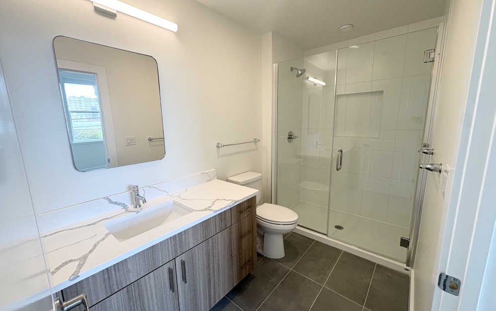 townhome bathroom with glass enclosed shower