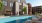 a pool in front of a building